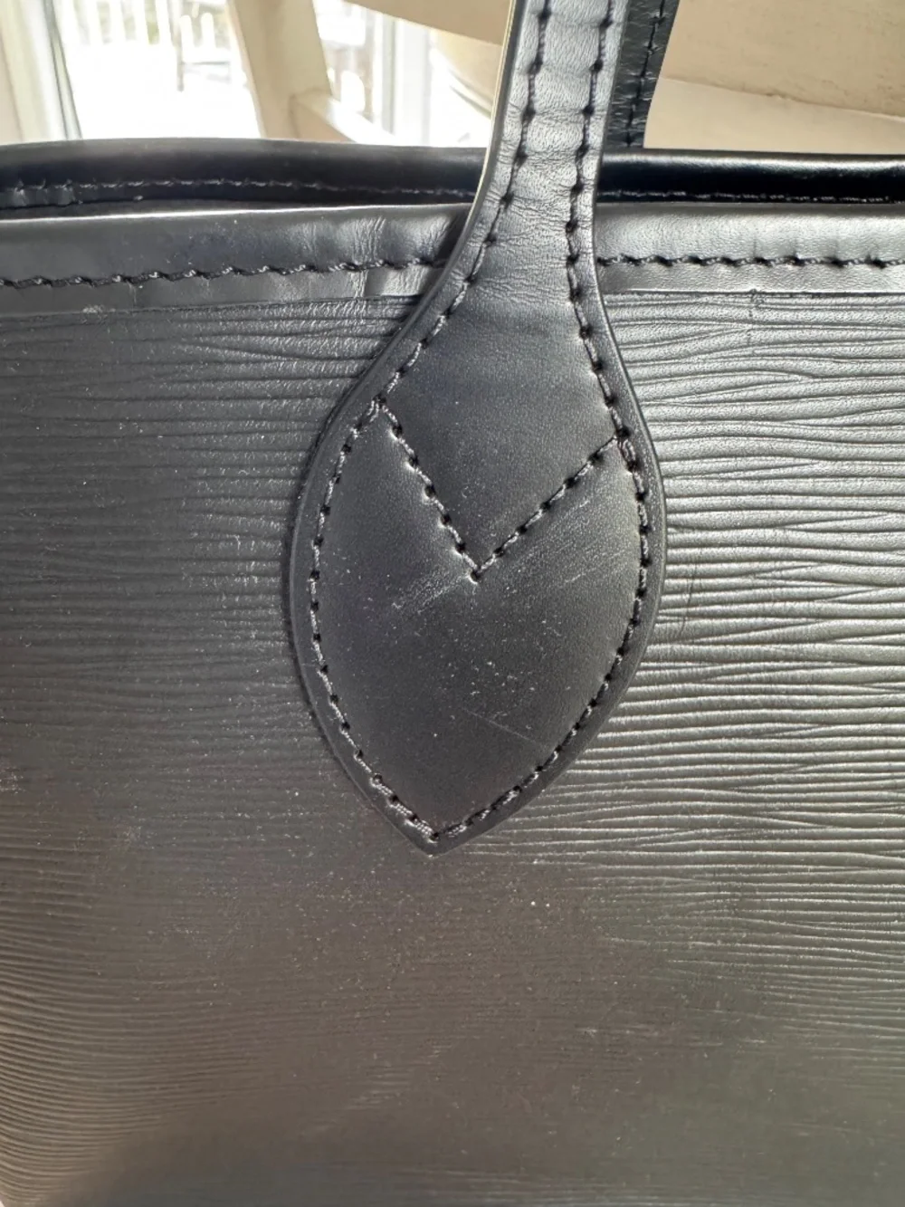 Louis Vuitton tag style